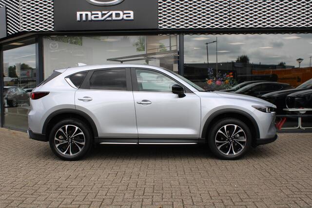 Mazda CX-5 2.0 SkyActiv-G 165 Newground Automaat, Trekhaak, All Season, LMV 19 Inch, Navi, Clima, Stoelverwarming, Stuurverwarming, Half Leder, Apple Carplay, HUD, Cruise, LKA, Elektrische klep