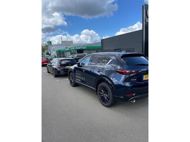 Mazda CX-5 2.0 e-SkyActiv-G M Hybrid 165 Homura & comfort pack Demovoordeel ¤ 7.390-, Navi, Adap.Cruise, Clima, Leder, Apple Carplay, 360 Camera, PDC, HUD, Stoelverwarming/ventilatie, 19" LMV, Elek.Achterklep