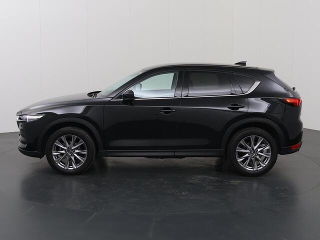 Mazda CX-5 2.0 SkyActiv-G 165 Luxury | 2000kg trekgewicht | Trekhaak | Navigatie | Stoelverwarming/koeling | Ele. verstelbare stoelen + geheugen | 360 Camera | DAB | Apple Carplay/Android Auto | HUD | Bose Audio |