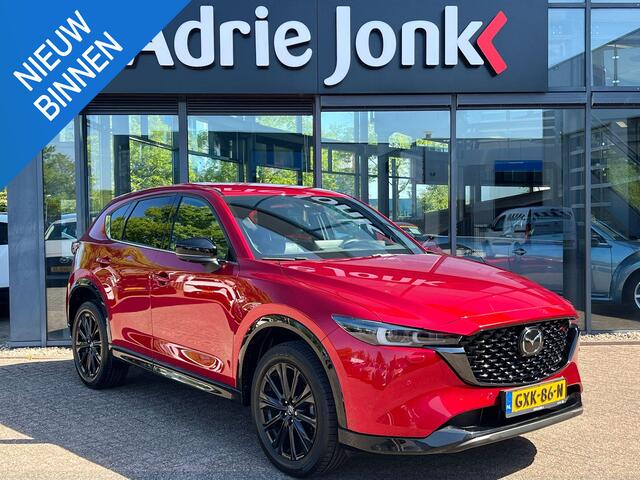Mazda CX-5 2.0 e-SkyActiv-G M Hybrid 165 Homura Comfort Pack | AUTOMAAT | NED AUTO | GARANTIE 12-2030 | LEDER | STUUR + STOEL VERWARMING | STOEL VENTILATIE | Bose AUDIO | 360gr CAMERA |