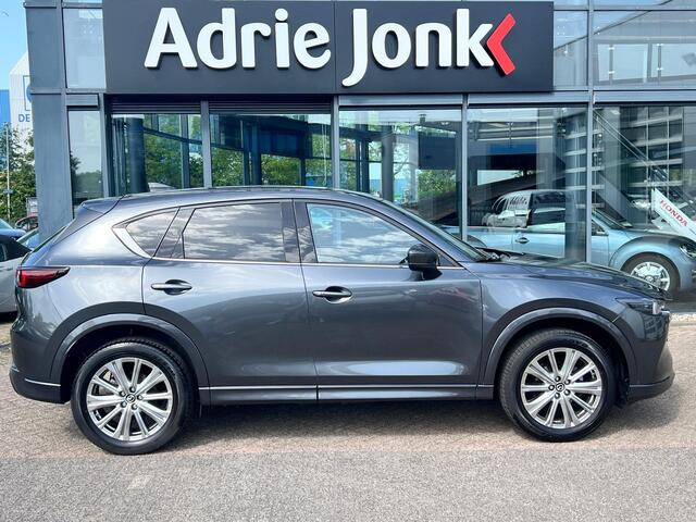 Mazda CX-5 2.0 e-SkyActiv-G M Hybrid 165 Takumi TREKHAAK | LEDER | Bose AUDIO | 360gr. CAMERA | El. A.KLEP | STOELVENTILATIE | STUUR- en STOEL VERWARMING | NED. AUTO | GARANTIE 6-2029 |