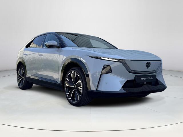 Mazda CX-6e Takumi 78 kWh | Nu met gratis trekhaak! | Stoelverwarming/Verkoeling | Stuurverwarming | 360* Camera | 50" Infotainment-scherm | Elektrische Achterklep |