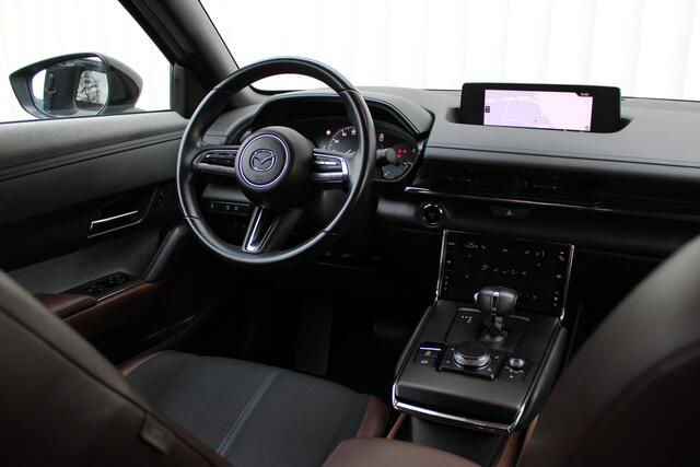 Mazda MX-30 e-SkyActiv 145 First Edition 36 kWh | Incl. 12 maanden garantie | Adapatieve cruise control | Apple Carplay/Android Auto | Parkeersensoren | Navigatie | Lane asist | Climate control | Stoelverwarming |