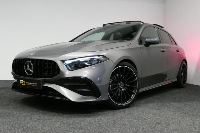 Mercedes-Benz A-KLASSE 200 AMG Line / Facelift / A45 AMG Diffuser / Panamericana Grill / Panoramadak / Elektr. verstelbare voorstoelen + memory / Ambienteverlichting / Apple Carplay - Andriod Auto / Adaptief onderstel AMG / Head-up display / Rondomzicht camera / Multibeam LED /