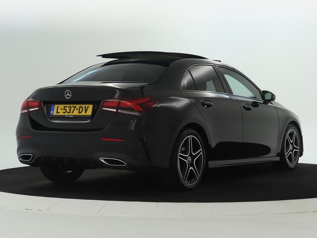 Mercedes-Benz A-KLASSE 180 Business Solution AMG | Panoramadak | Sfeerverlichting | Augmented Reality | Stoelverwarming | Parkeerpakket met Camera | Inclusief 24 maanden Mercedes-Benz Certified garantie voor Europa.