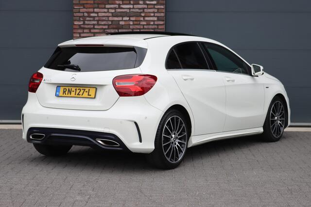 Mercedes-Benz A-KLASSE 180 AMG Line White Art Edition | Panoramadak | Camera | Trekhaak | Apple Carplay | Leder | High Perf. LED | Keyless Start | Regensensor |