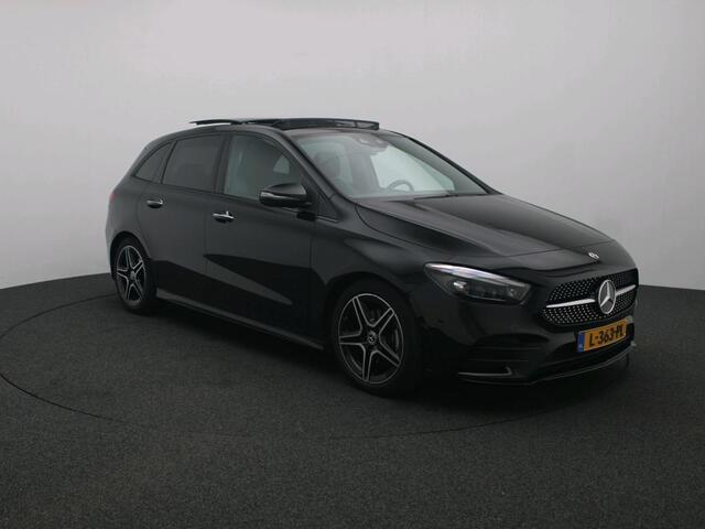 Mercedes-Benz B-KLASSE 180 AMG Nightpakket | Trekhaak | Panoramadak | Sfeerverlichting | Memory | Keyless Go | Dode Hoek Ass | Inclusief 24 maanden Mercedes-Benz Certified garantie voor Europa.