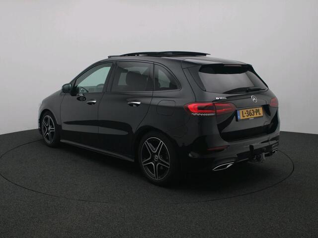 Mercedes-Benz B-KLASSE 180 AMG Nightpakket | Trekhaak | Panoramadak | Sfeerverlichting | Memory | Keyless Go | Dode Hoek Ass | Inclusief 24 maanden Mercedes-Benz Certified garantie voor Europa.