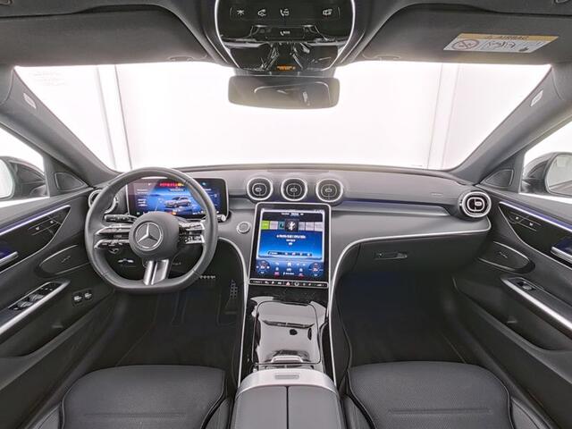 Mercedes-Benz C-KLASSE Estate 300 e AMG Plug-In Hybride AMG Line | Night Pakket | Trekhaak | Panorama Schuif-Kanteldak. Inclusief 24 maanden MB Certified garantie voor Europa.