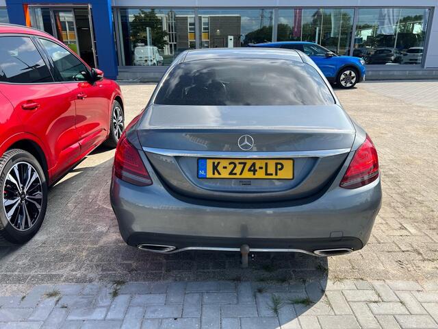 Mercedes-Benz C-KLASSE 180 Business Solution AMG | Stoelverwarming | Achteruitrijcamera | Climate Control | Cruise Control