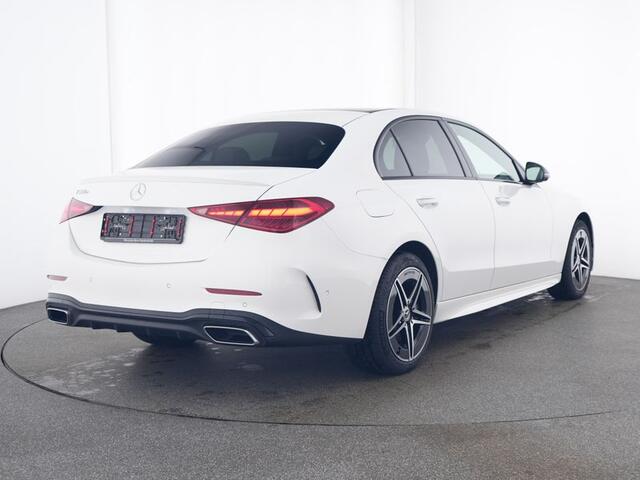 Mercedes-Benz C-KLASSE 300 e AMG Line I Panorama dak I Distronic + I 360° camera I Burmester I Head-up I Digital Light I Memory I Sfeerverlichting I I Stoelverwarming I Comfort onderstel I Thermotronic I MBUX I Keyless GO l