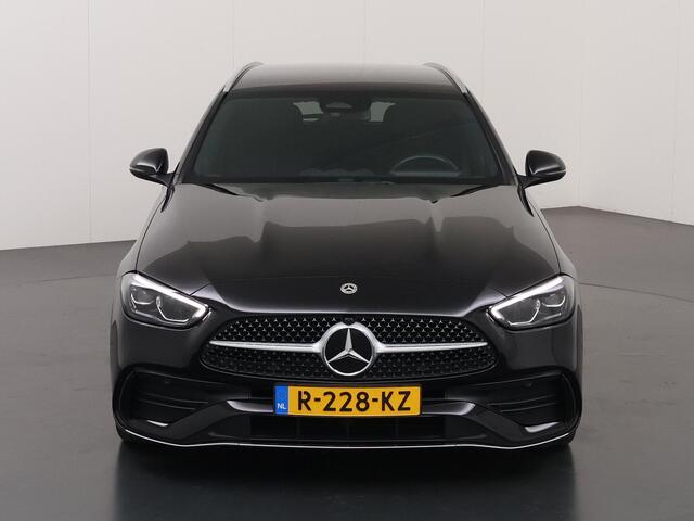 Mercedes-Benz C-KLASSE Estate 180 AMG Line | Distronic | Zwarte hemel | Stoelverwarming | Apple carplay/Android auto | Achterruitrijcamera | Stoelverwarming voor | Sfeerverlichting |