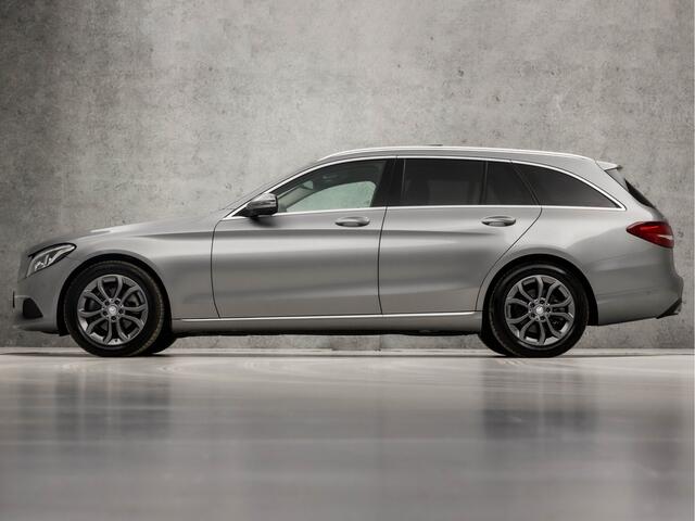 Mercedes-Benz C-KLASSE Estate 180 AMG Sport 157Pk Automaat (DUBBEL PANORAMADAK, 1e EIGENAAR, NAVIGATIE, STOELVERWARMING, GETINT GLAS, LEDER, SPORTSTOELEN, ELEK ACHTERKLEP, CRUISE CONTROL, NIEUWSTAAT)