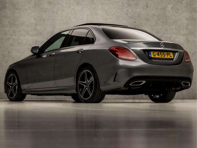 Mercedes-Benz C-KLASSE 180 AMG Sport 157Pk Automaat (DUBBEL PANORAMADAK, NAVIGATIE, LEDER, BURMESTER, ELEK SPORTSTOELEN, ZWART HEMEL, CAMERA, DODEHOEK ASSISTENT, NIEUWE APK, NIEUWSTAAT)