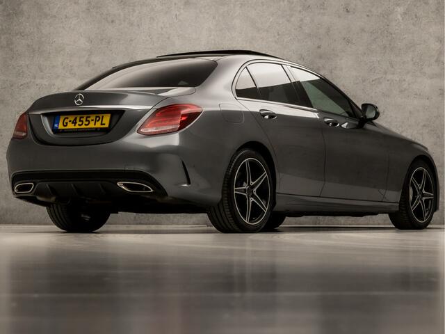 Mercedes-Benz C-KLASSE 180 AMG Sport 157Pk Automaat (DUBBEL PANORAMADAK, NAVIGATIE, LEDER, BURMESTER, ELEK SPORTSTOELEN, ZWART HEMEL, CAMERA, DODEHOEK ASSISTENT, NIEUWE APK, NIEUWSTAAT)