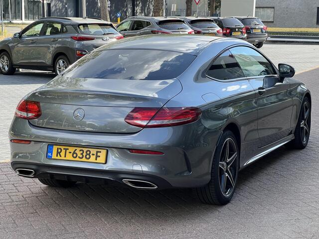 Mercedes-Benz C-KLASSE Coupé 180 Ambition | Schuifkanteldak | Stoelverwarming | Dodehoekdetectie | Navigatie
