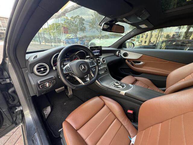 Mercedes-Benz C-KLASSE Coupé 180 Ambition | Schuifkanteldak | Stoelverwarming | Dodehoekdetectie | Navigatie