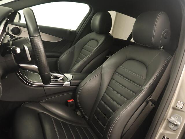 Mercedes-Benz C-KLASSE 200 Business Solution AMG | Leder | Carplay | Navigatie | Stoelverwarming | Camera | Adaptive cruise | Full LED | LMV 18 inch