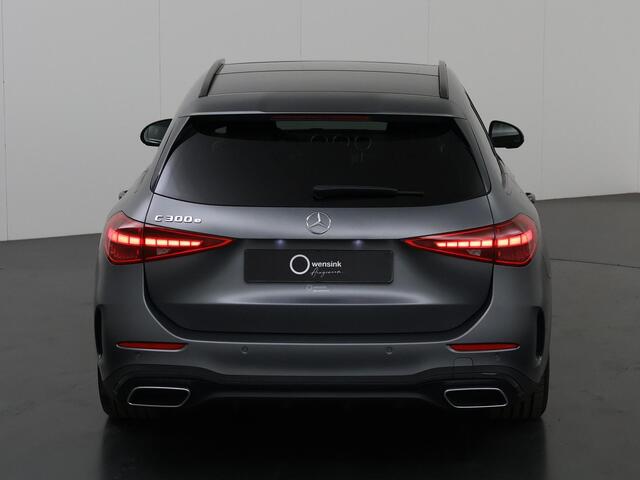 Mercedes-Benz C-KLASSE 300e Estate AMG Line | Panoramadak | Matgrijs | Night | Rijassistentiepakket | Sfeerverlichting |