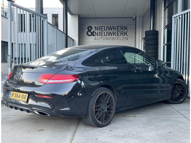 Mercedes-Benz C-KLASSE Coupé 180 Premium Plus AMG | AUTOMAAT | LEDER | CAMERA | NAVI | CRUISE CONTROL | CLIMATE CONTROL | PDC V+A | LMV 19'' | LED | BLUETOOTH