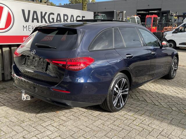 Mercedes-Benz C-KLASSE Estate 300 e Luxury Line 18"/Panoramadak/Trekhaak/Laser LED/Leder + memory l + r/Stoel + stuurverwarming/360 camera/Keyless/Adaptieve cruise/Dodehoek/Sfeerverlichting