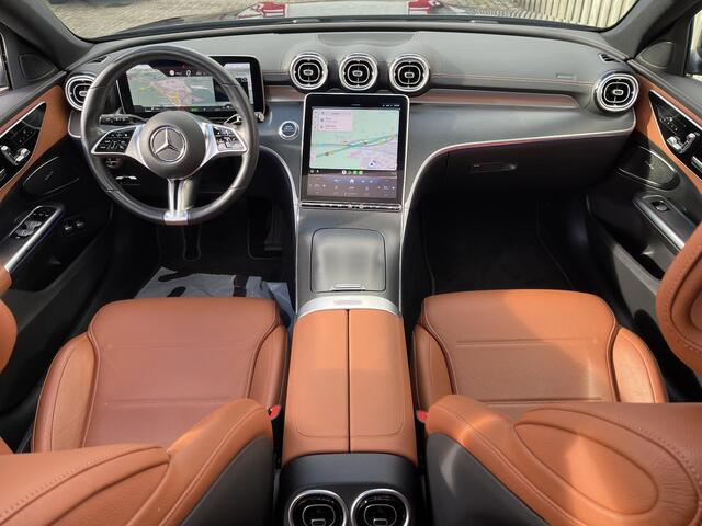 Mercedes-Benz C-KLASSE Estate 300 e Luxury Line 18"/Panoramadak/Trekhaak/Laser LED/Leder + memory l + r/Stoel + stuurverwarming/360 camera/Keyless/Adaptieve cruise/Dodehoek/Sfeerverlichting