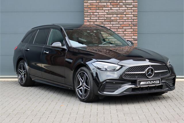 Mercedes-Benz C-KLASSE Estate 300 e AMG Line | Panoramadak | Distronic | Trekhaak | Memory | Sfeerverlichting Premium | Stoelverwarming | Nightpakket | Camera | Dodehoekassistent |