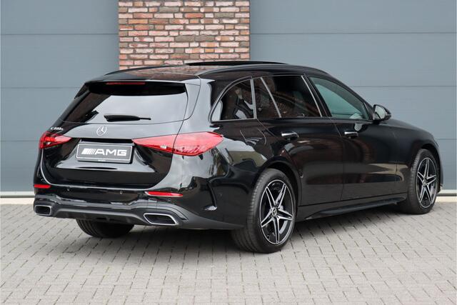 Mercedes-Benz C-KLASSE Estate 300 e AMG Line | Panoramadak | Distronic | Trekhaak | Memory | Sfeerverlichting Premium | Stoelverwarming | Nightpakket | Camera | Dodehoekassistent |