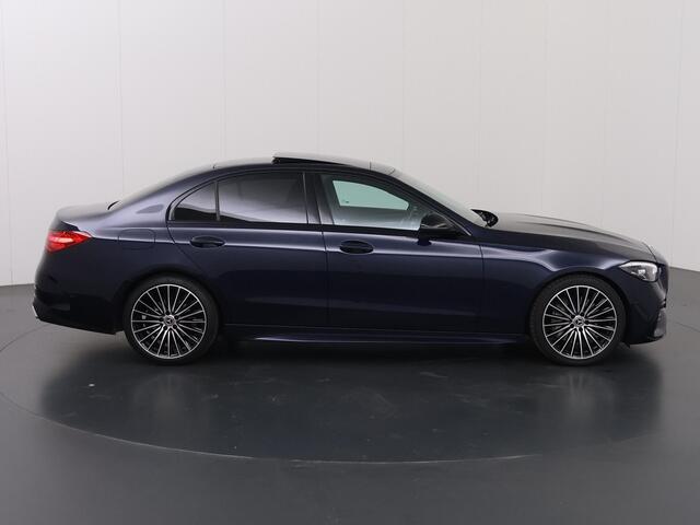 Mercedes-Benz C-KLASSE 180 AMG Line | Night | Panoramadak | Sfeerverlichting | Stoelverwarming | 19" lichtmetalen velgen |