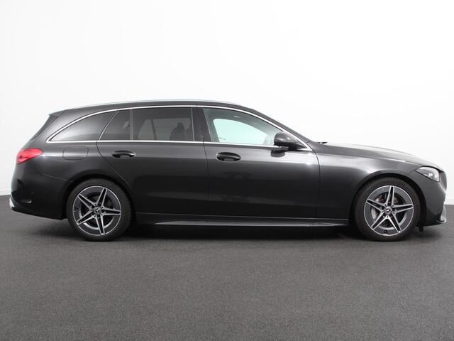 Mercedes-Benz C-KLASSE Estate 200 AMG Line | Climate control | Achteruitrijcamera | Wegklapbare trekhaak | Navigatie | Dodehoek assistent | LED | Sfeerverlichting | Adaptieve cruise control | Verwarmde voorstoelen | Elektrische kofferbak