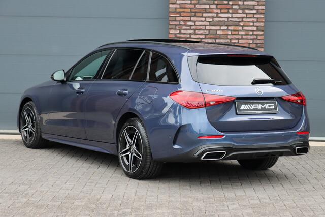 Mercedes-Benz C-KLASSE Estate 300 e AMG Line | Distronic | Panoramadak | Memory | Camera | Trekhaak | High Perf. LED | Nightpakket | Sfeerverlichting Premium | Stoelverwarming | Dodehoekassistent |