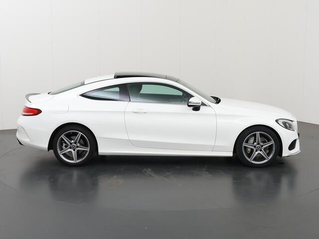 Mercedes-Benz C-KLASSE Coupé 180 Premium Plus | AMG Styling | Panoramadak | Stoelverwarming | LED Koplampen | Sfeerverlichting | Parkeerassistent