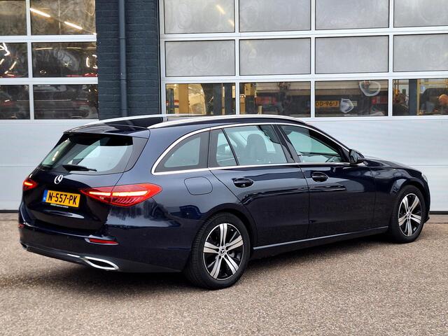 Mercedes-Benz C-KLASSE Estate 200 Launch Edition Luxury Line | Trekhaak | Rijassistentiepakket | Achteruitrijcamera | Sfeerverlichting | Stoelverwarming | Dodehoekassistentie | Elektrische achterklep