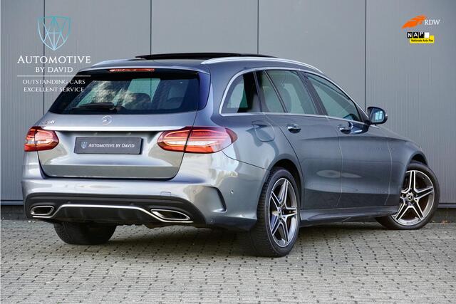 Mercedes-Benz C-KLASSE Estate C200 AMG LINE 184 pk BUS. SOLUTION AUTOMAAT / PANORAMADAK / MATRIX LED / LEDER / ACHTERUITRIJCAMERA / DIGI COCKPIT / NL AUTO / BTW AUTO / APPLE CARPLAY / SFEERVERLICHTING