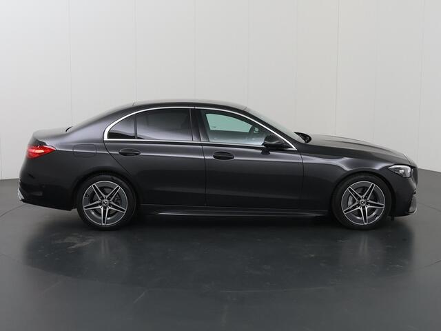 Mercedes-Benz C-KLASSE 180 AMG Line | Distronic | Achteruitrijcamera | Sfeerverlichting | Stoelverwarming |