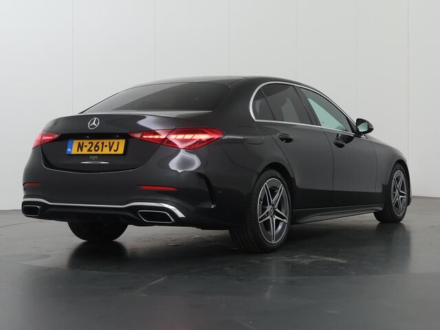 Mercedes-Benz C-KLASSE 180 AMG Line | Distronic | Achteruitrijcamera | Sfeerverlichting | Stoelverwarming |