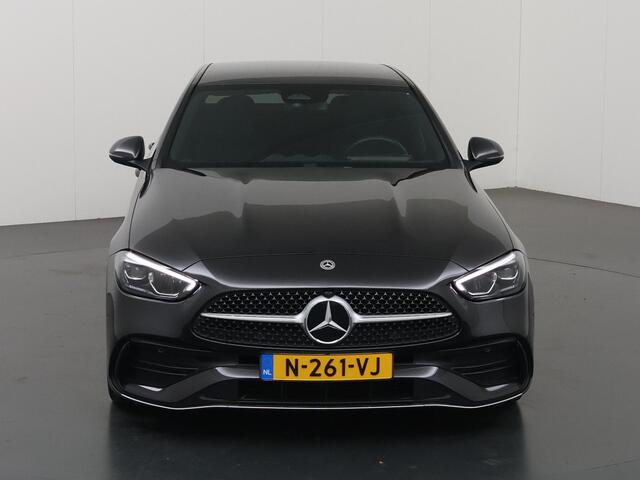 Mercedes-Benz C-KLASSE 180 AMG Line | Distronic | Achteruitrijcamera | Sfeerverlichting | Stoelverwarming |