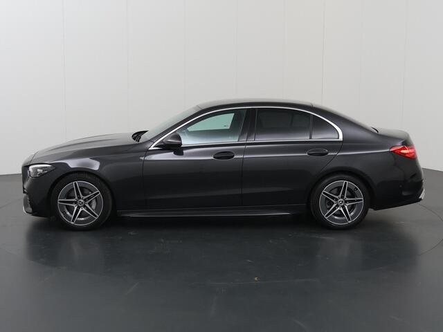 Mercedes-Benz C-KLASSE 180 AMG Line | Distronic | Achteruitrijcamera | Sfeerverlichting | Stoelverwarming |