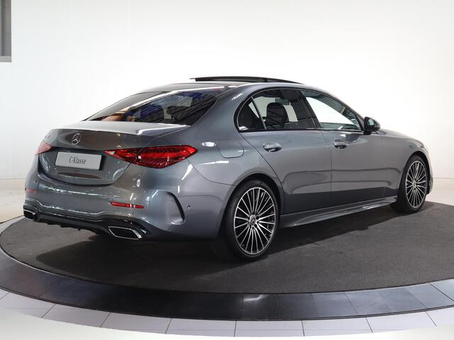 Mercedes-Benz C-KLASSE 180 Business Solution AMG | Night | Panoramadak | Trekhaak | Memory stoelen | Sfeerverlichting | Digital light | 19" Multispaaks |