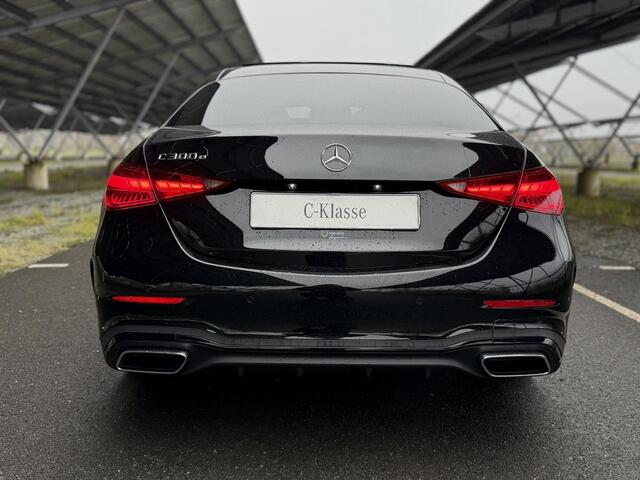 Mercedes-Benz C-KLASSE 300e Business Solution AMG | Night | Panoramadak | 360 camera | Memory stoelen | Digital light | Sfeerverlichting |