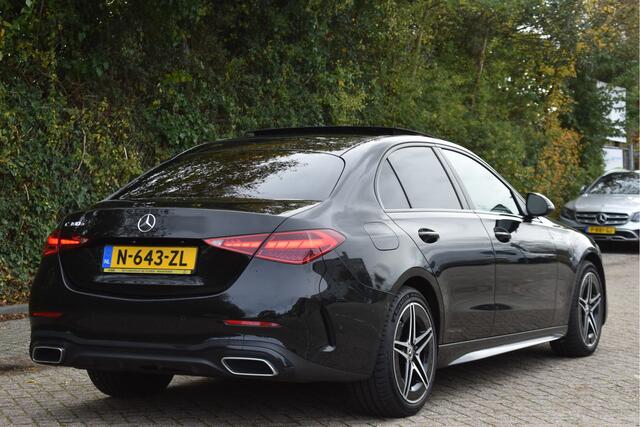 Mercedes-Benz C-KLASSE 300 e AMG Line 313 pk | NL-Auto | Trekhaak | Open dak | Virtual cockpit | Camera | Carplay | Sfeerverlichting | Full LED | LM-Velgen | NAP