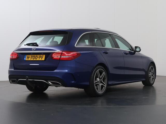 Mercedes-Benz C-KLASSE Estate 200 Business Solution AMG | Panoramadak | Widescreen | Stoelverwarming | Navigatie | High Performance koplampen |