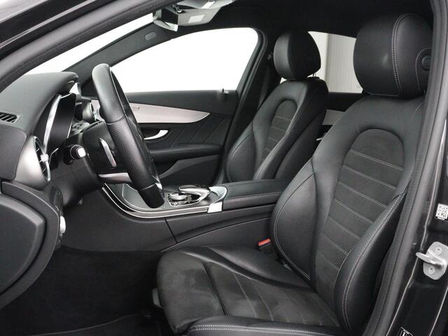 Mercedes-Benz C-KLASSE 300e Business Solution AMG Limited | SOH 82,2% | 360 Camera | Stoelverwarming | Leder/Alcantara | Carplay | Matrix LED | Navigatie | Cruise control | Park Assist | Sfeerverlichting | PHEV | Plug In