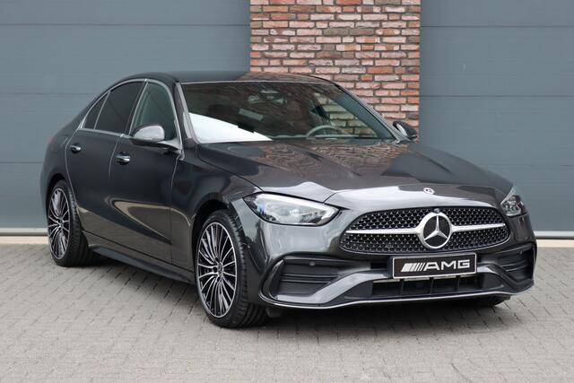 Mercedes-Benz C-KLASSE 300 e 4MATIC AMG Line | Massage | HUD | Memory | Leder | Keyless Go | Dodehoekassistent | Digital Light | Augmented Reality | Surround Camera | Advanced Sound System |