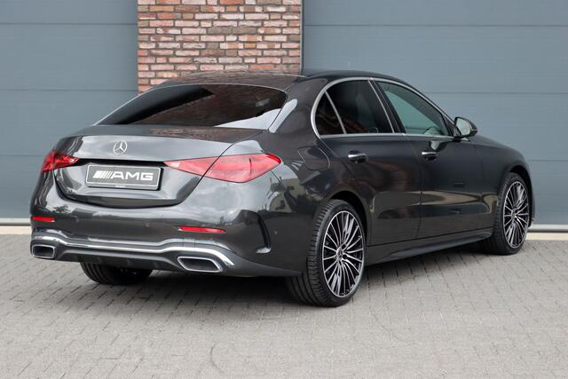 Mercedes-Benz C-KLASSE 300 e 4MATIC AMG Line | Massage | HUD | Memory | Leder | Keyless Go | Dodehoekassistent | Digital Light | Augmented Reality | Surround Camera | Advanced Sound System |
