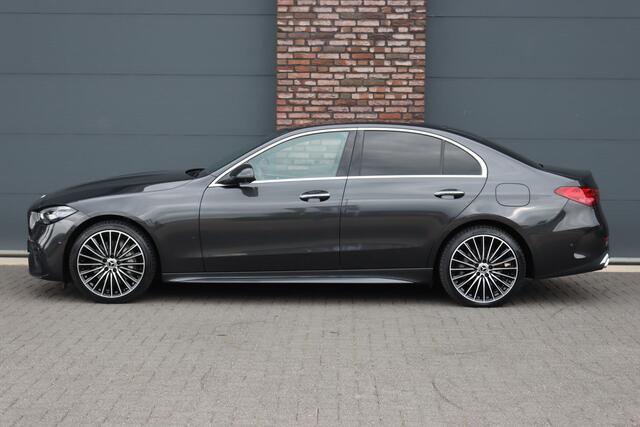 Mercedes-Benz C-KLASSE 300 e 4MATIC AMG Line | Massage | HUD | Memory | Leder | Keyless Go | Dodehoekassistent | Digital Light | Augmented Reality | Surround Camera | Advanced Sound System |