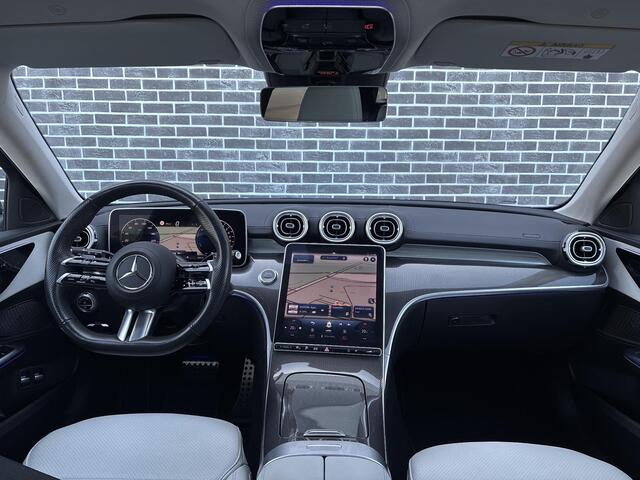 Mercedes-Benz C-KLASSE Estate 300 e AMG Line | Panoramadak | Stoelverwarming | Cruise Control Adaptief | MBUX Navigatie | Achteruitrijcamera | Parkeersensoren | LED Koplampen | Elektrische Achterklep | Plug-in Hybrid (PHEV)