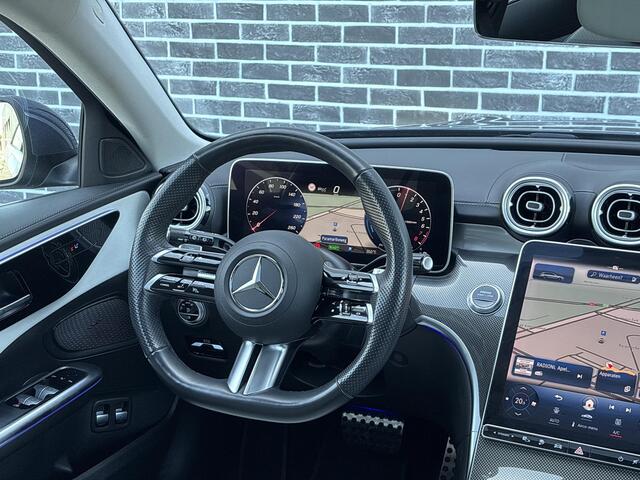 Mercedes-Benz C-KLASSE Estate 300 e AMG Line | Panoramadak | Stoelverwarming | Cruise Control Adaptief | MBUX Navigatie | Achteruitrijcamera | Parkeersensoren | LED Koplampen | Elektrische Achterklep | Plug-in Hybrid (PHEV)