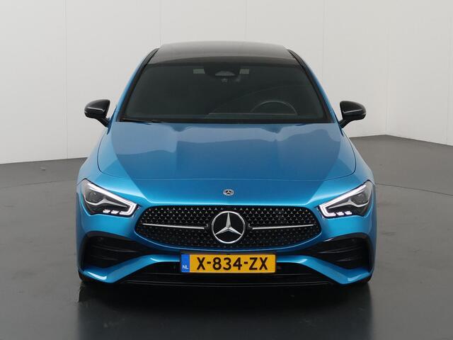 Mercedes-Benz CLA-KLASSE 180 AMG Line | Panoramadak| Night | Parkeercamera | 19" lichtmetalen velgen | Stoelverwarming | Keyless Go |
