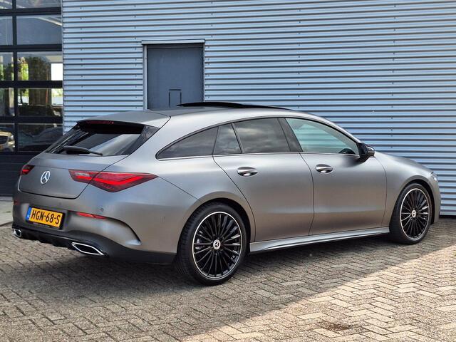 Mercedes-Benz CLA-KLASSE Shooting Brake 180 Star Edition AMG | Matgrijs | Nightpakket | Panoramadak | Dodehoekassistent | Apple CarPlay | Android Auto | Sfeerverlichting | Stoelverwarming | Achteruitrijcamera | Elektrisch Inklapbare Buitenspiegels